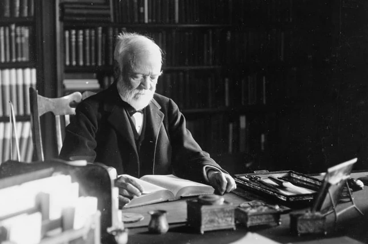 Historic photograph of Andrew Carnegie working at his desk